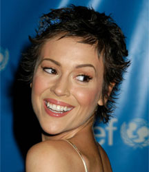 Alyssa Milano with short updo and headband with bow