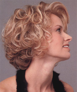 model with short curly hair side view left