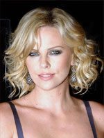 Charlize Theron with short and wavy hair