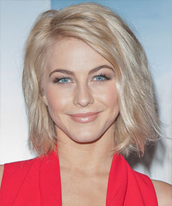 Julianne Hough with wavy style and tousled effect style in blonde