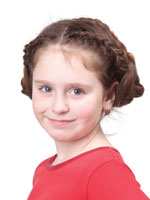 kid with side braided hairstyle