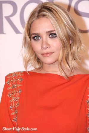 Medium-length choppy hair cut with waves and tousled texture are becoming a 