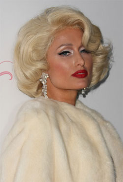 Paris Hilton posing with Marilyn Monroe's style in 2010