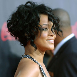 Rihanna with short curly hair
