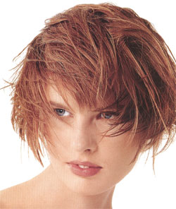 short hair model with tousle style and red hair color