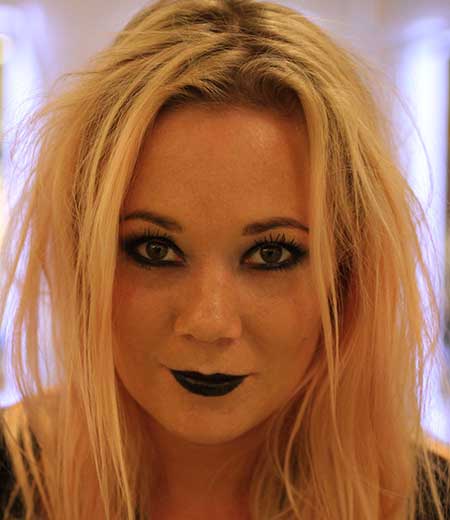 modern witch makeup with black lips