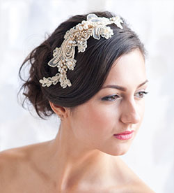 simple hairstyle in dark hair color decorated with gold lace headpiece