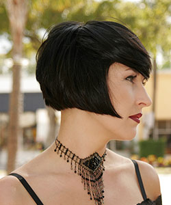 black hair color above chin haircut in classic bob profile view