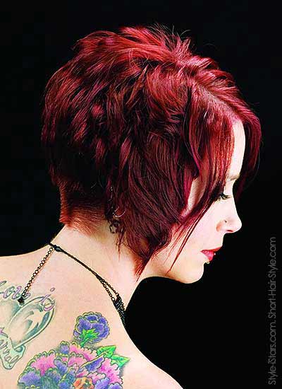 a diagonal haircut in red violet - side view