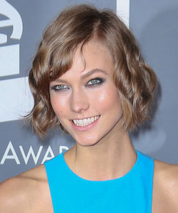 Karlie Kloss with short bob haircut in wavy style