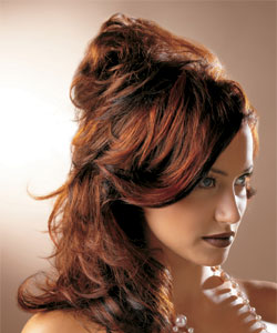 model with long hair in wine red and medium brown hair color