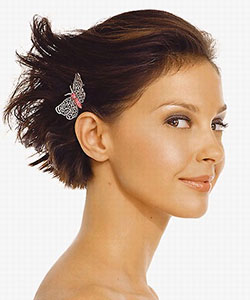 Ashley Judd with butterfly hair accessories on short hair