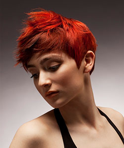short hair with bright red orange peek-a-boo effect on earthly brown - side view