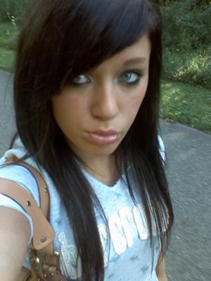 Long hairstyle with asymmetric look and dark hair color that been cut into Long hairstyle with asymmetric look and dark hair color that been cut into