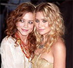 Mary and Ashley Olsen with wavy and curly hair