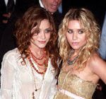 Mary and Ashely Olsen with curly hair style