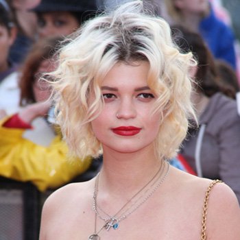 Pixie Geldof with short platinum blond and dark root